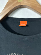 Hugo Boss black long-sleeved crew-neck T-shirt with a "NEW 1938 MOTORBIKE" graphic print.