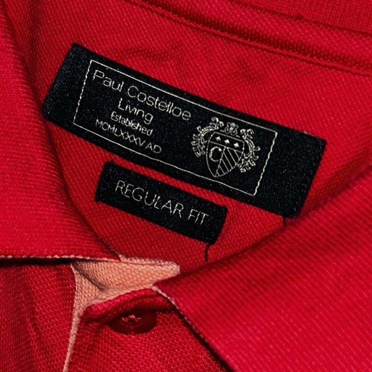 red Paul Costelloe regular fit polo shirt. 
Size medium large 
SKU 7173
L 30 W 24