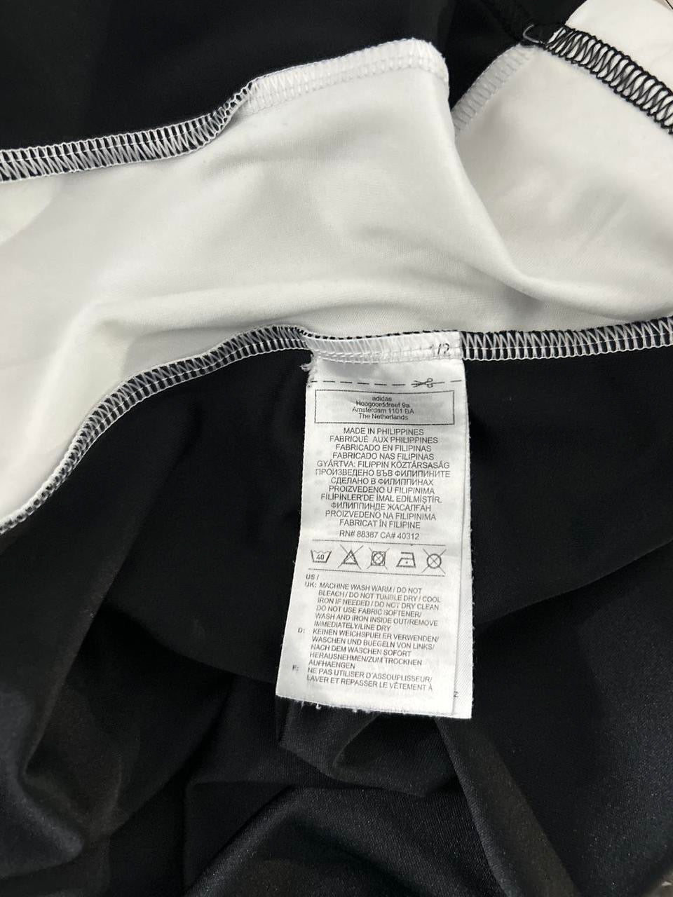 Men’s vintage Black and white Adidas sportswear t-shirt #sportswear
Size L
SKU 7146
Collar to hem 30
Pit to pit 21