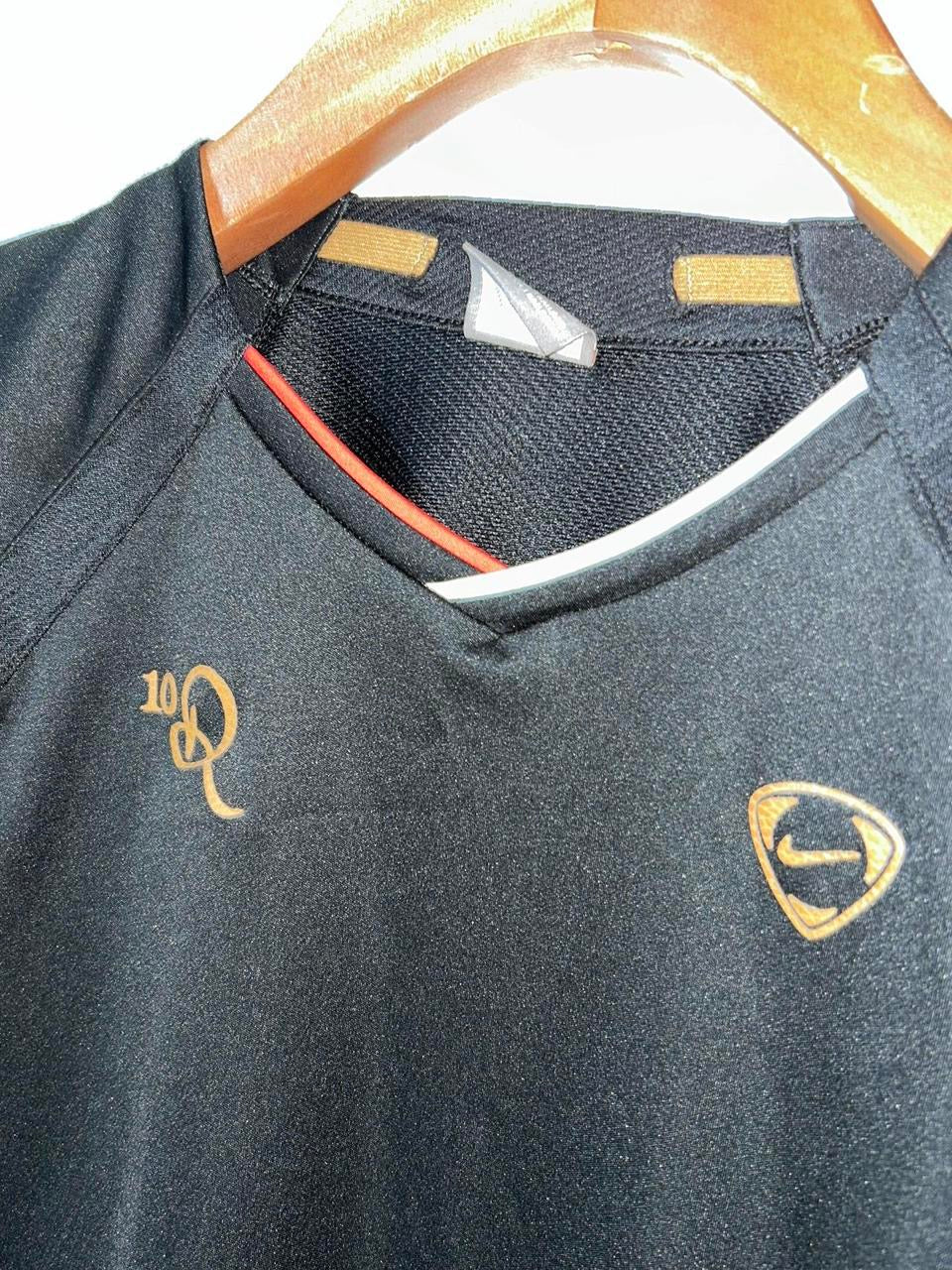 black Nike Ronaldinho 2006-07 Total 90 football training shirt with red and gold accents
