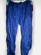 90s Blue vintage nylon sweatpants with elastic waistband, featuring a relaxed fit clothing in size medium Waist 36 length 30  sku 7056