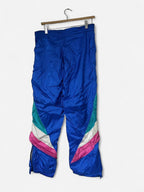 Blue Adidas track pants with drawstring waist, zipper pockets and elasticated ankles adidas #trackpants