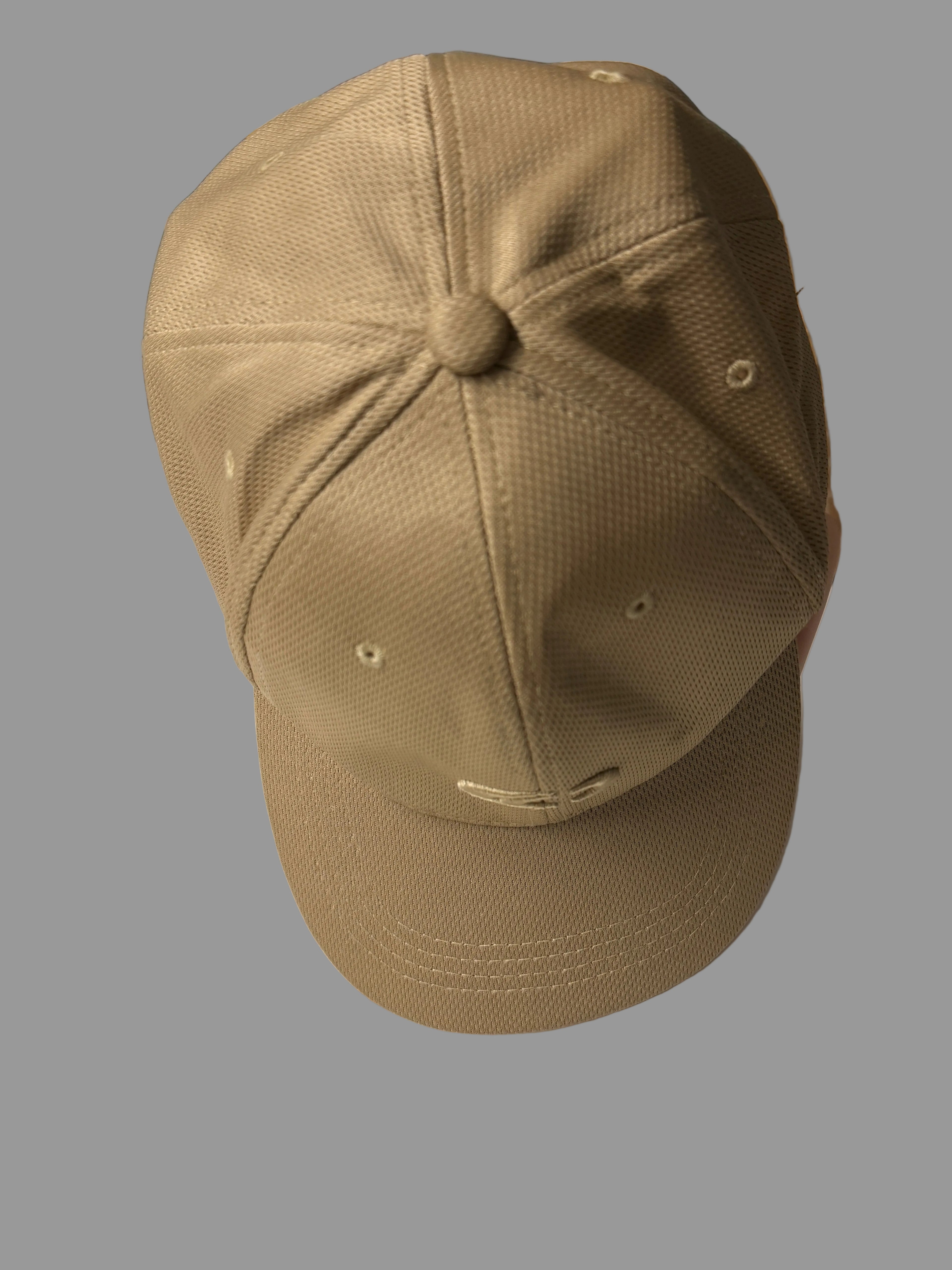 Brown cap on a white surface with a blurred background