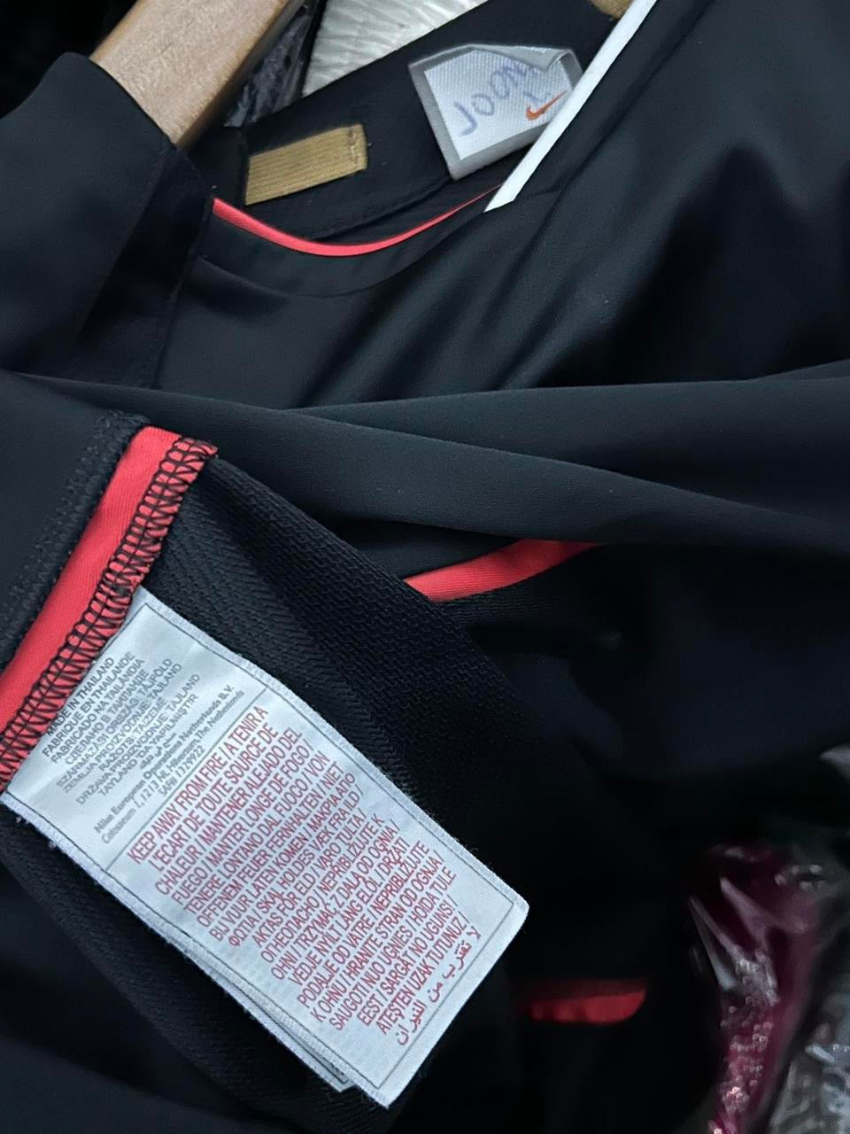 black Nike Ronaldinho 2006-07 Total 90 football training shirt with red and gold accents