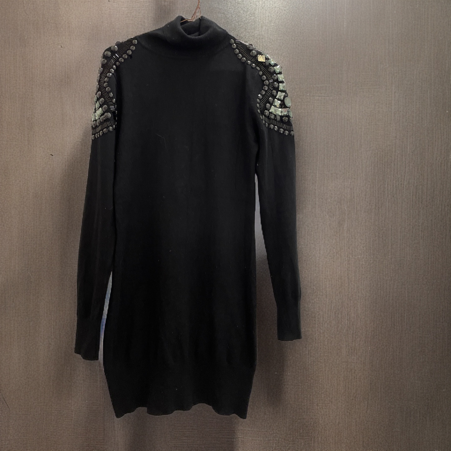 Women turtle neck oversize black jumper with studded design