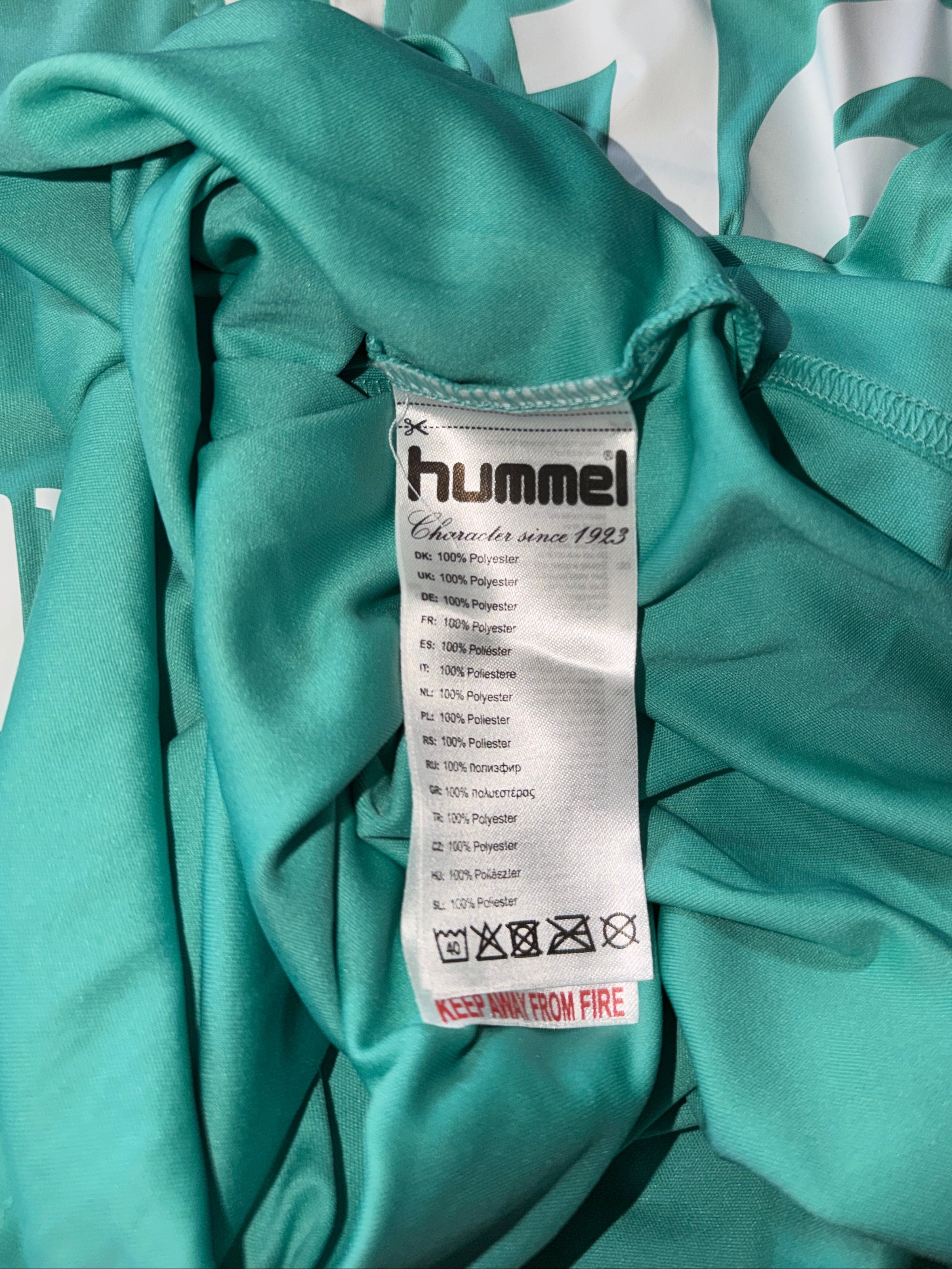 Hummel Core SS Poly Jersey, likely a team handball jersey for SC DHfK Leipzig, featuring the number 16 and sponsors "Allianz Griesbach & Bisch".  SizeSKU 7351
