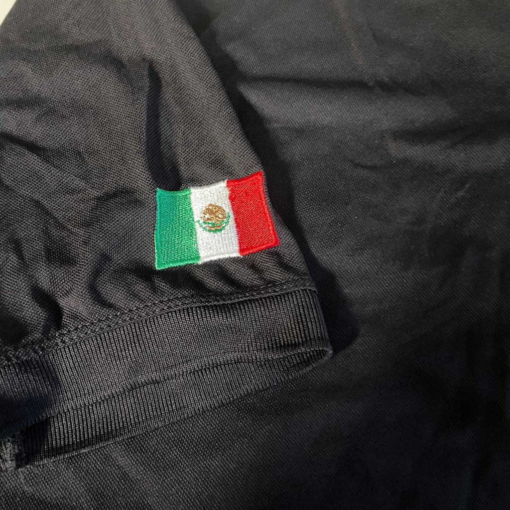 Vintage men Playerytees Sport black polo tees in L|L31 W20|SKU 5541