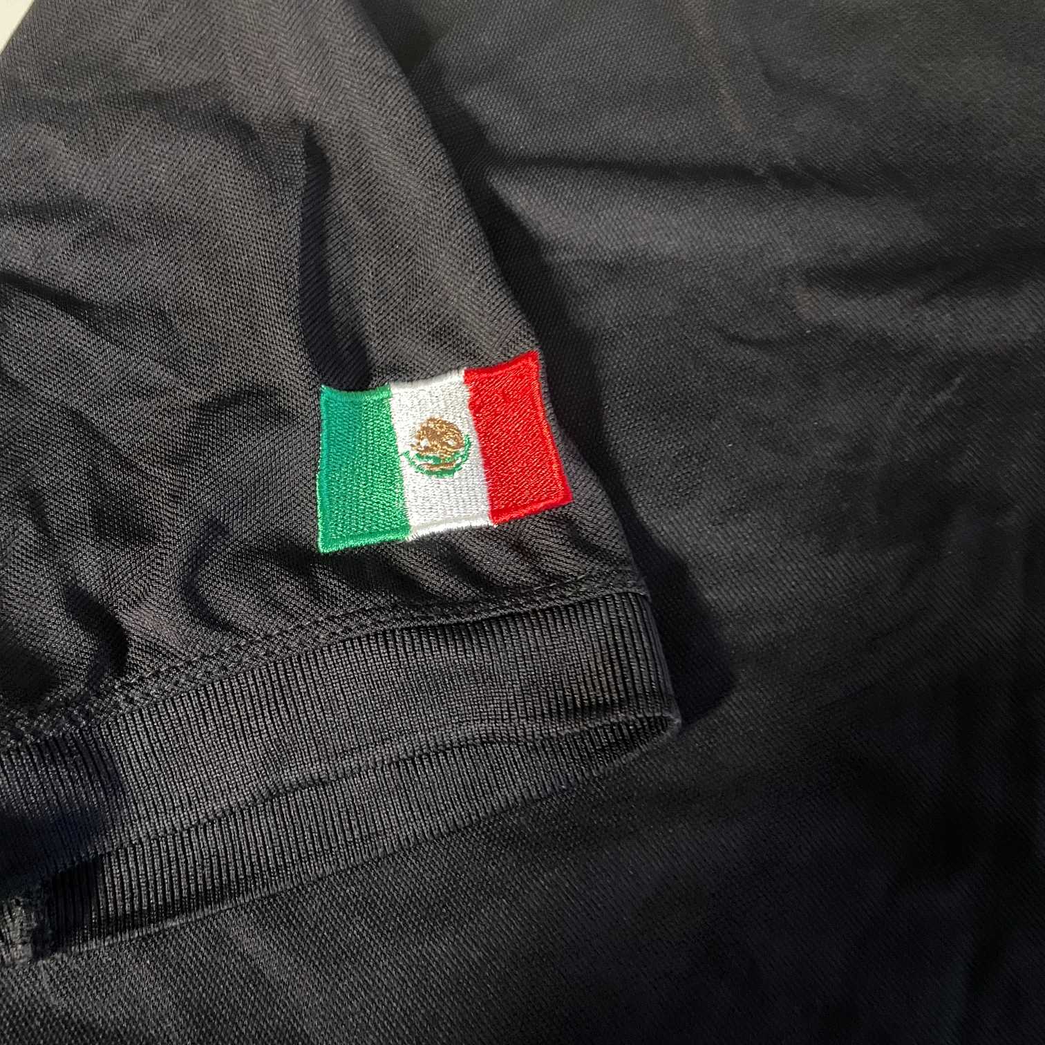 Vintage men Playerytees Sport black polo tees in L|L31 W20|SKU 5541