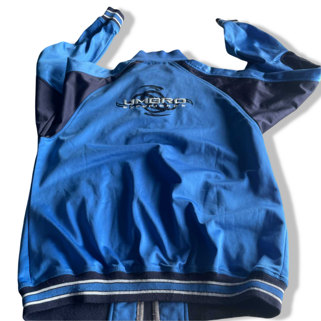 Vintage women Umbro blue full zip wind breaker track jacket in S|L27 W18| SKU 5630