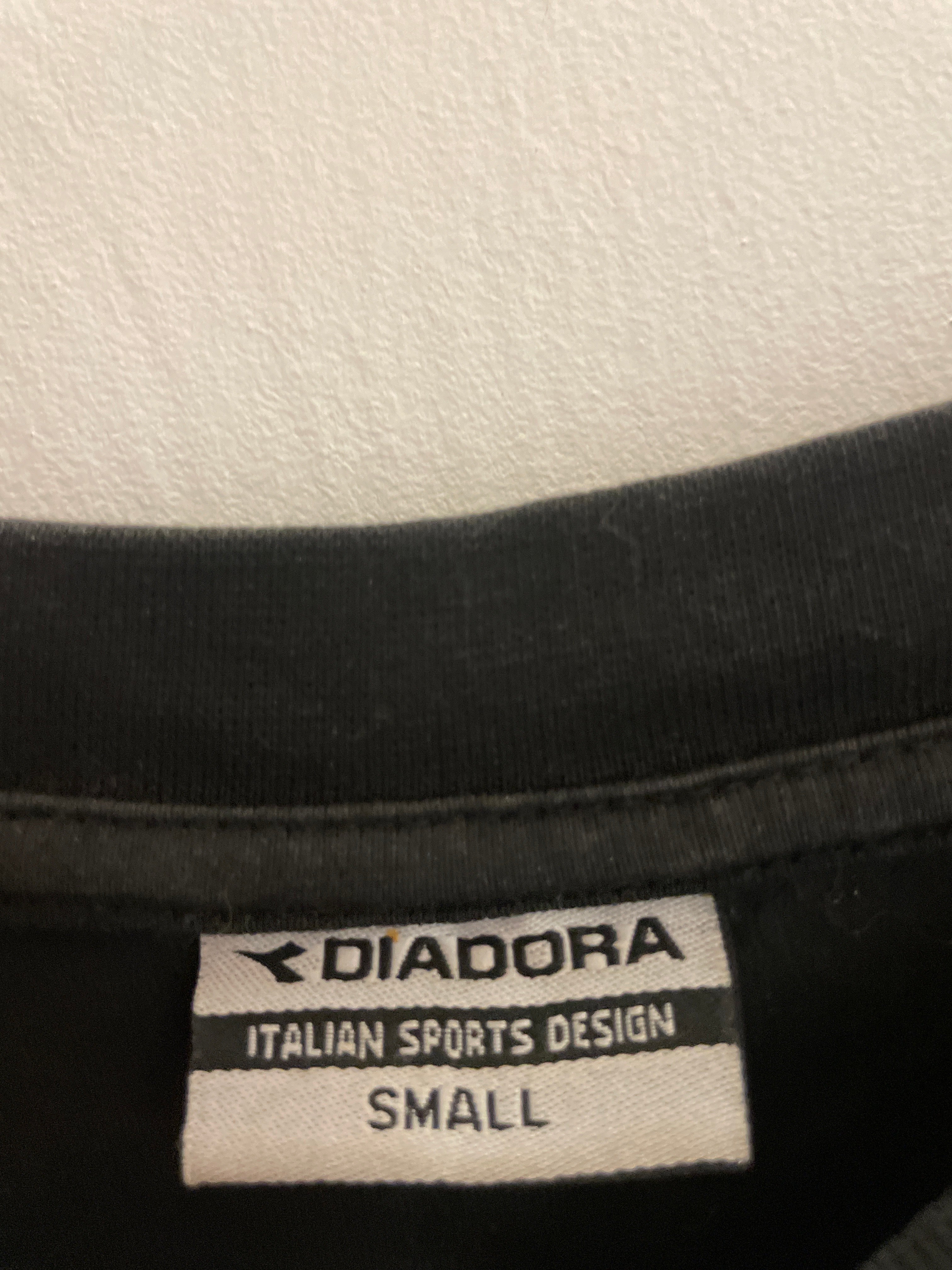 Vintage black diadora italian sport design tshirt size S
