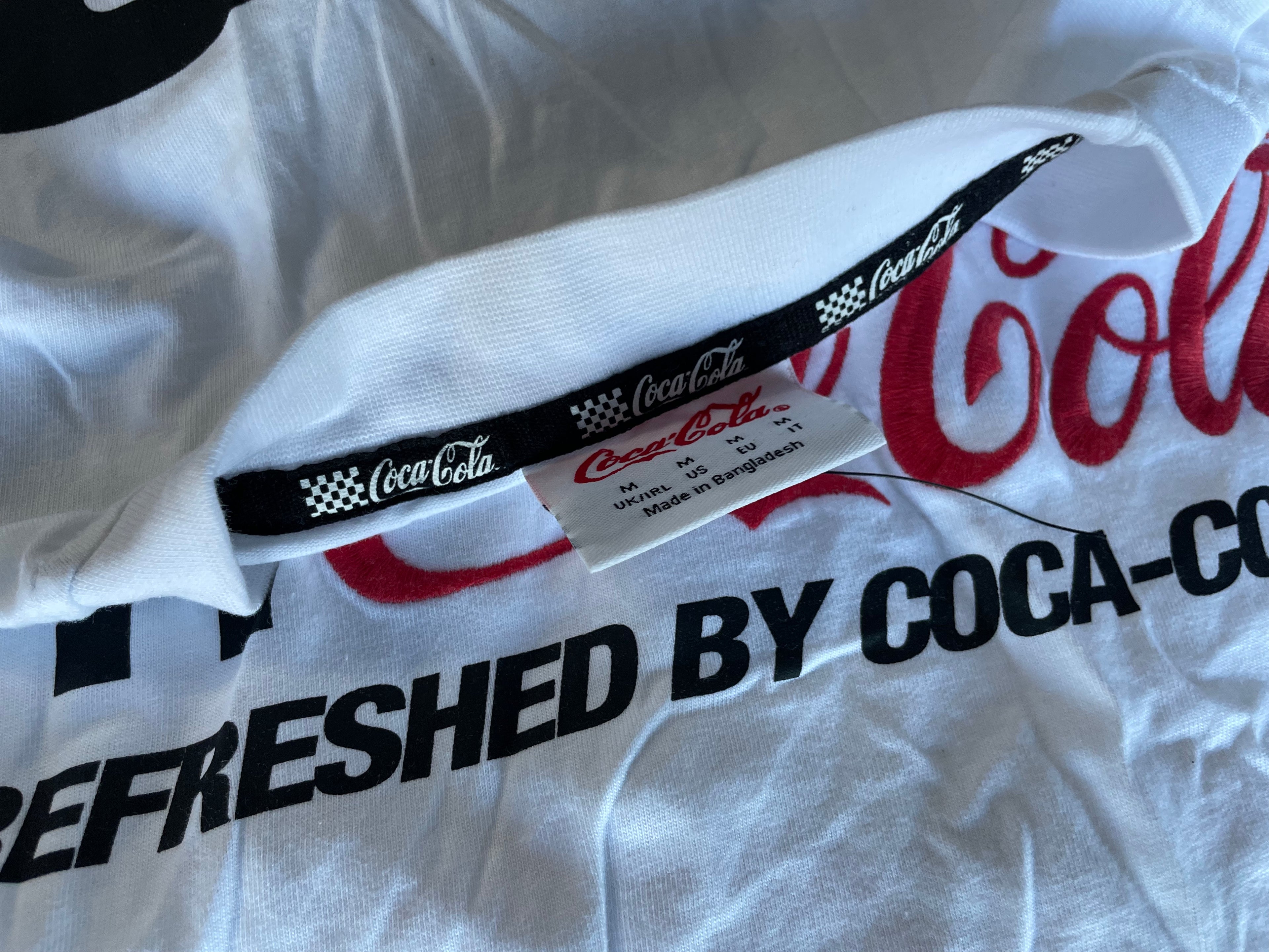 Vintage Coca Cola graphics white short sleeve tees in M| L29 W20| SKU 4438
