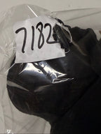 Black glove with a white label on a white background