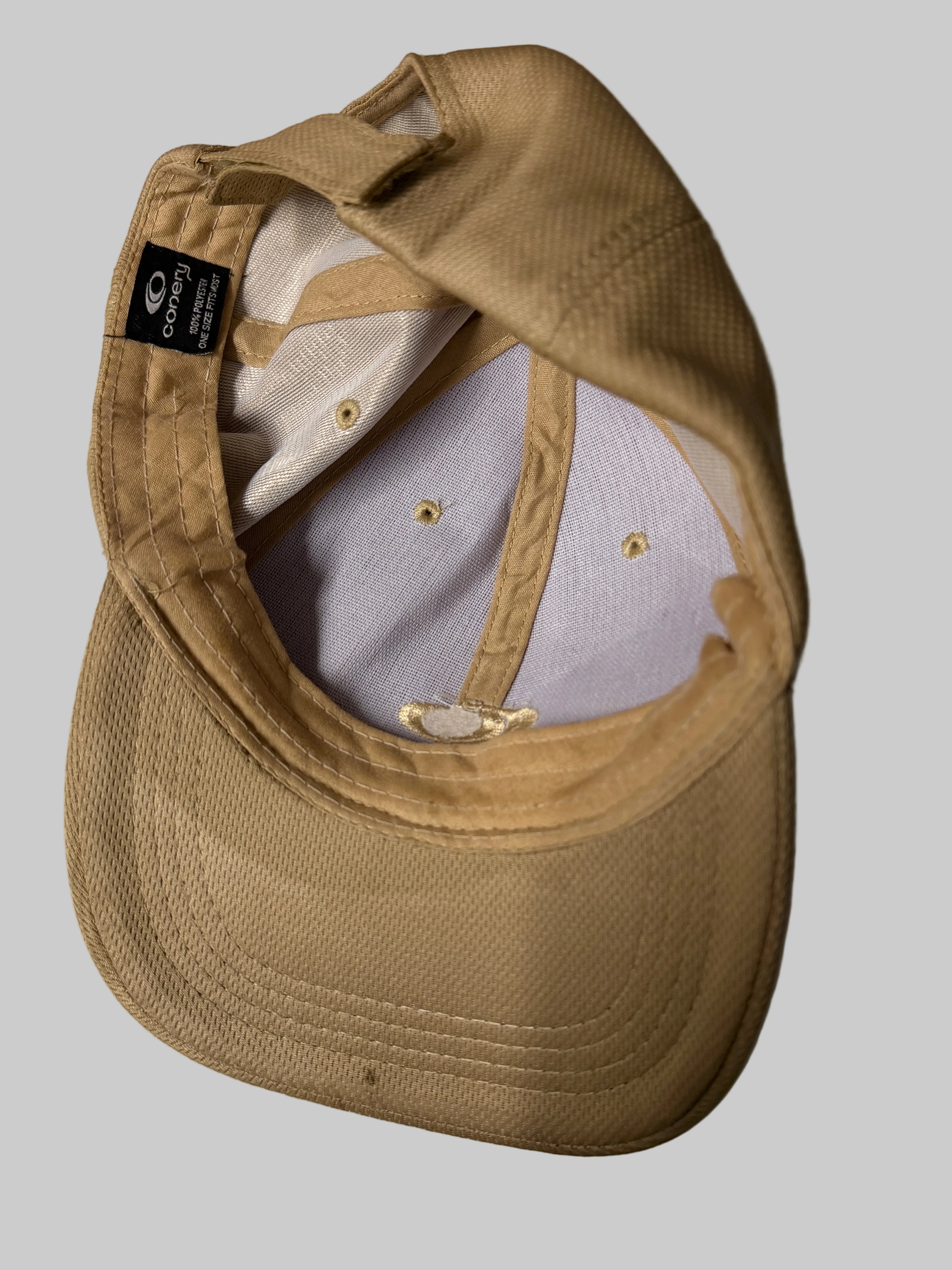Beige cap with a brand logo on a white background
