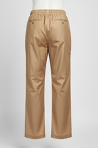 A pair of beige wide-leg trousers shown from the back on a white mannequin against a light gray studio background.