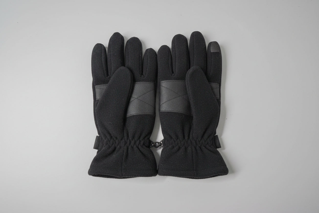 Pair of black gloves with gray accents on a white background