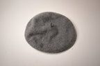 Round gray filter on a white background