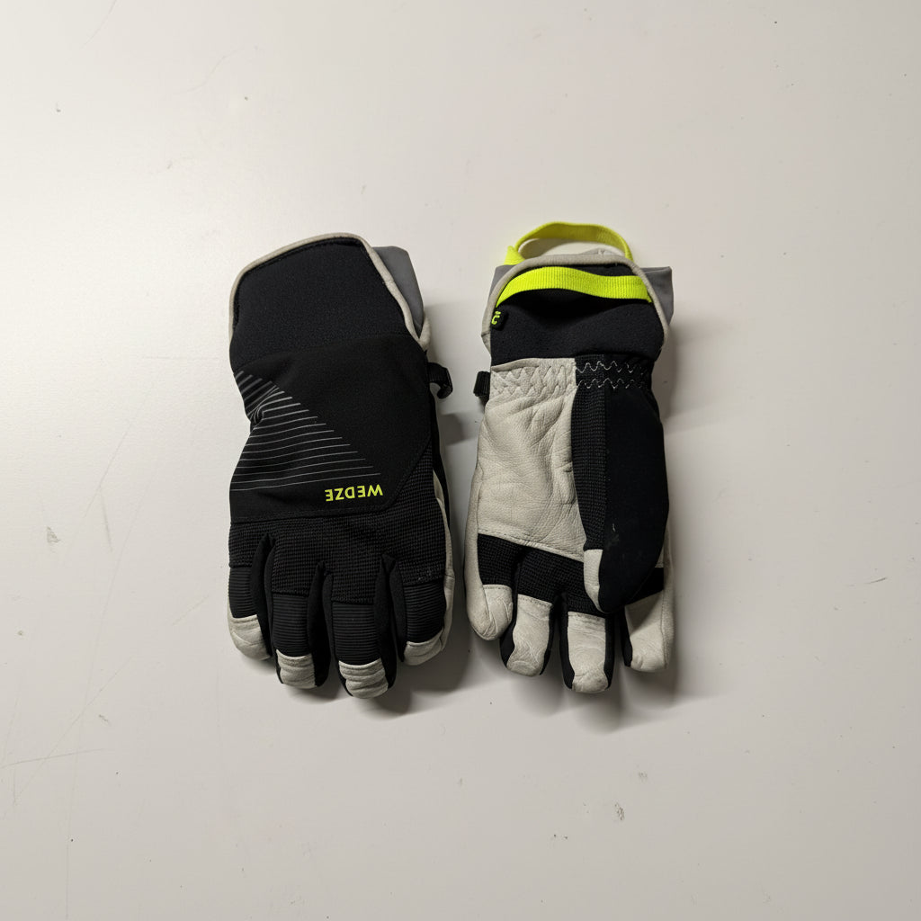 Pair of black and gray gloves with 'WEDZE' branding on a white background