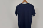 Nike Dri-FIT football jersey featuring a navy blue color with a white swoosh logo. SIZE L SKU 7466