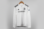 White sports jersey with black accents on a hanger against a gray background