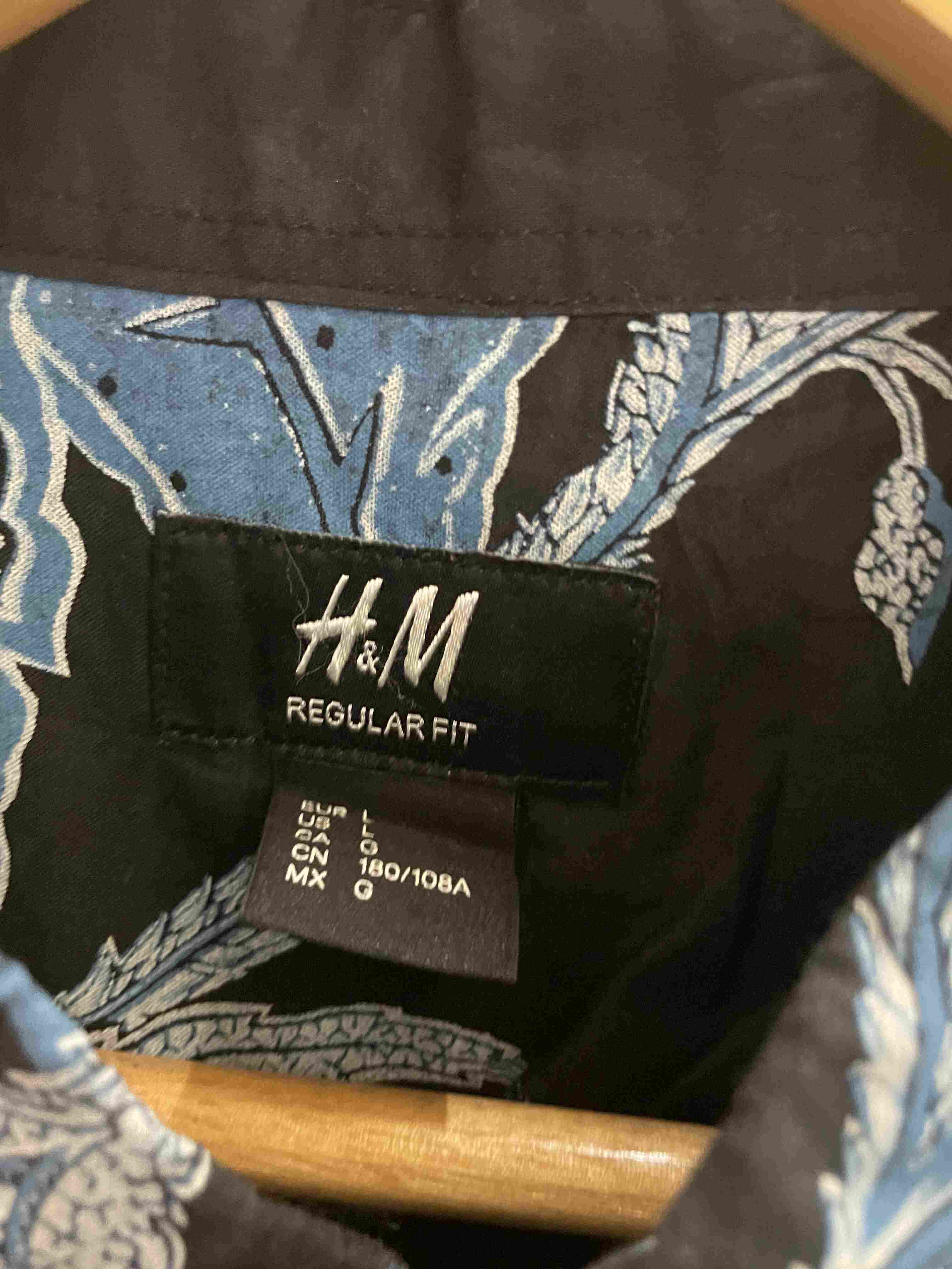 Vintage H&M regular fit black floral print short sleeve shirt size L