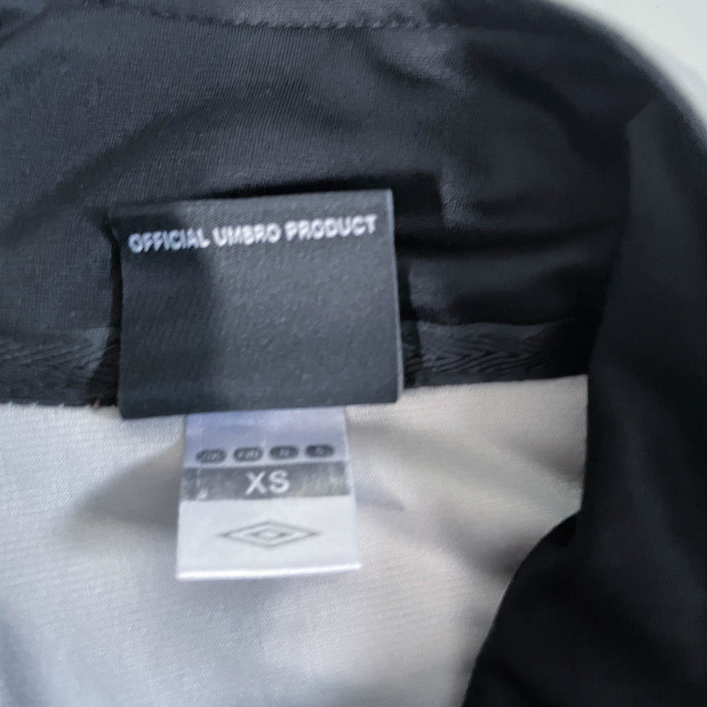 Vintage unisex Umbro grey full zip windbreaker jacket in XS/S|L27 W20|SKU 6489