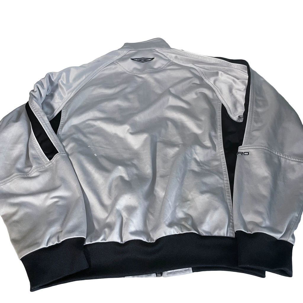 Vintage unisex Umbro grey full zip windbreaker jacket in XS/S|L27 W20|SKU 6489