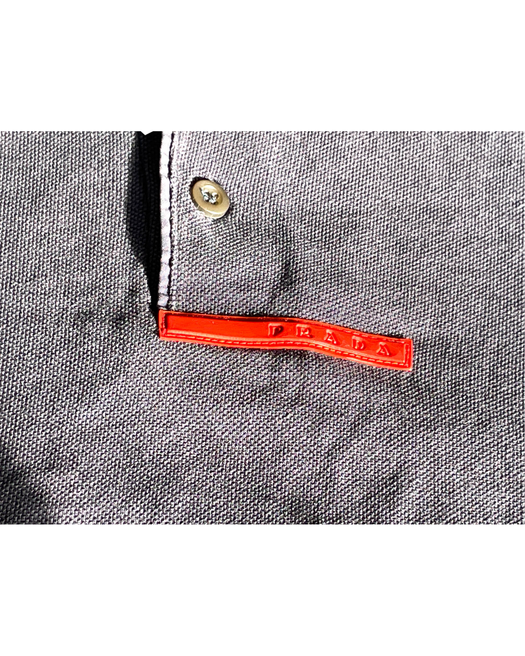 Vintage Prada Navy Polo. In size medium