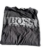Vintage Hugo Boss Men's Grey and Green T-Shirt. In size medium