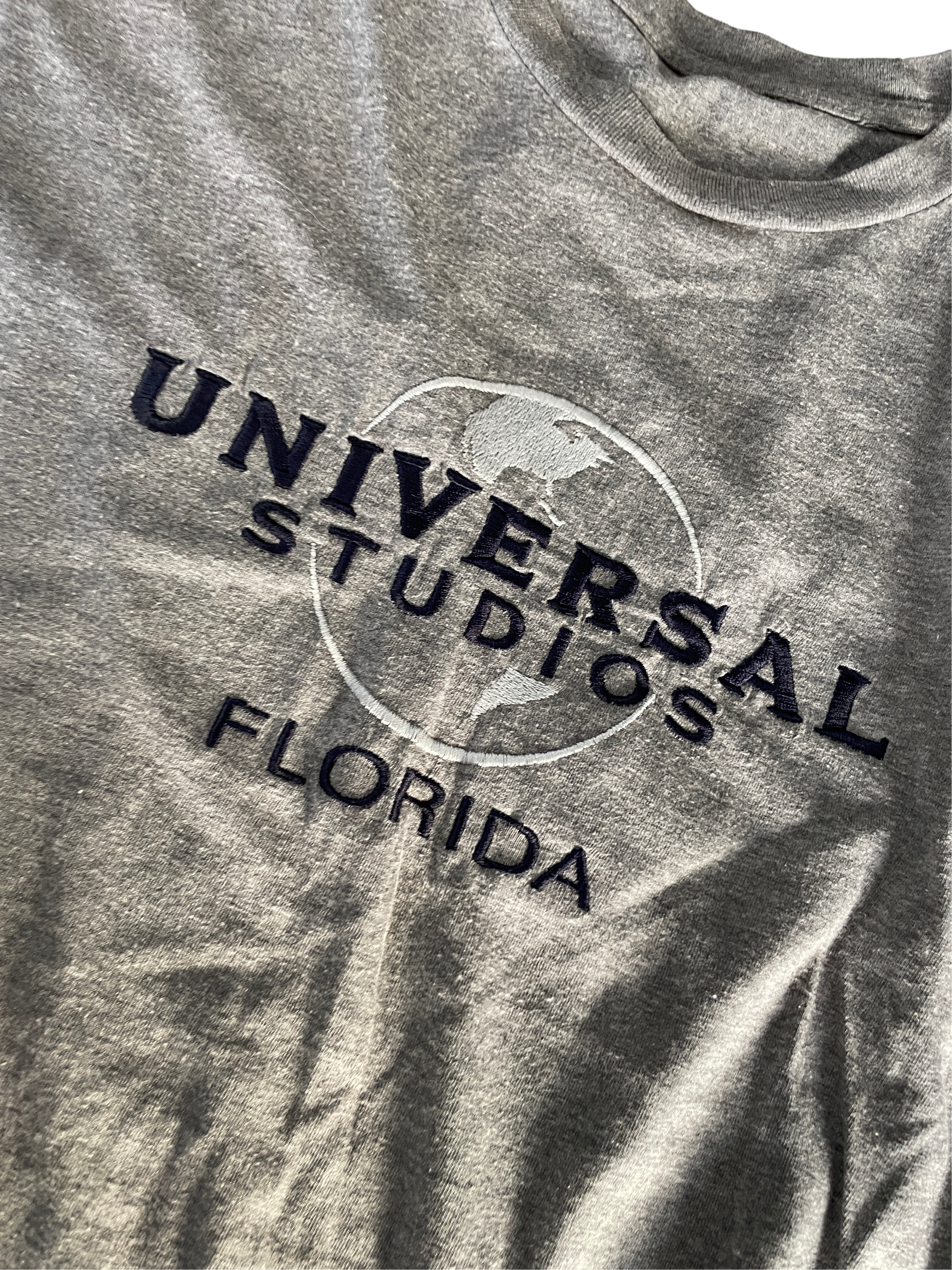 Vintage 90s Universal &nbsp;souvenir Studios Orlando Embroidered Shirt Men's Grey T-shirt &nbsp;Size M/L Faded Navy Logo L 30 W 21 SKU 5166