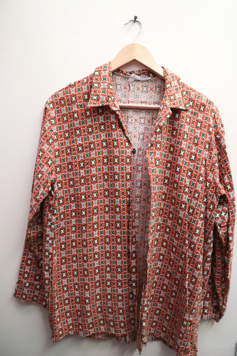 Vintage womens long sleeve orange pattern medium shirt