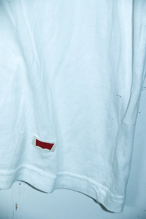 Vintage men's Levi's white V-neck plain tees in L|L30 W23|SKU 6572