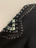 Women turtle neck oversize black jumper with studded design