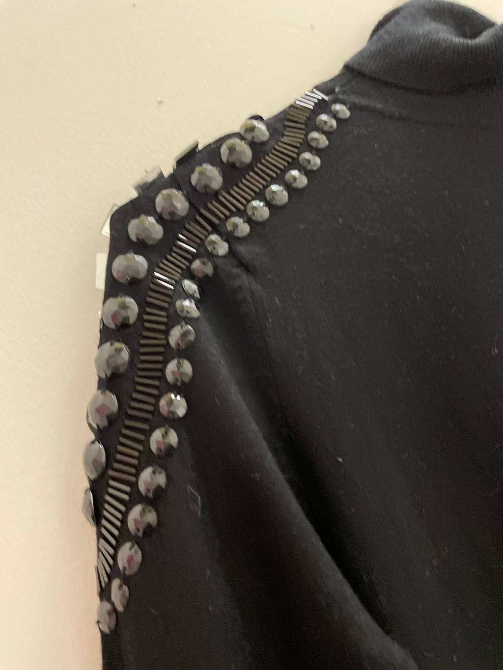 Women turtle neck oversize black jumper with studded design