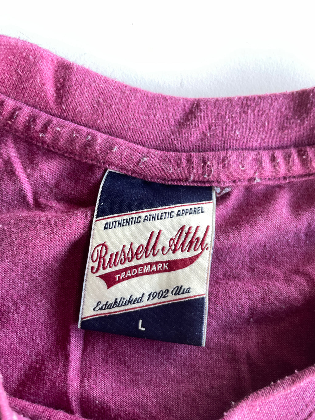 Vintage men's Russel athletic graded logo t shirt in burgundy in L| L27 W19| SKU 5360