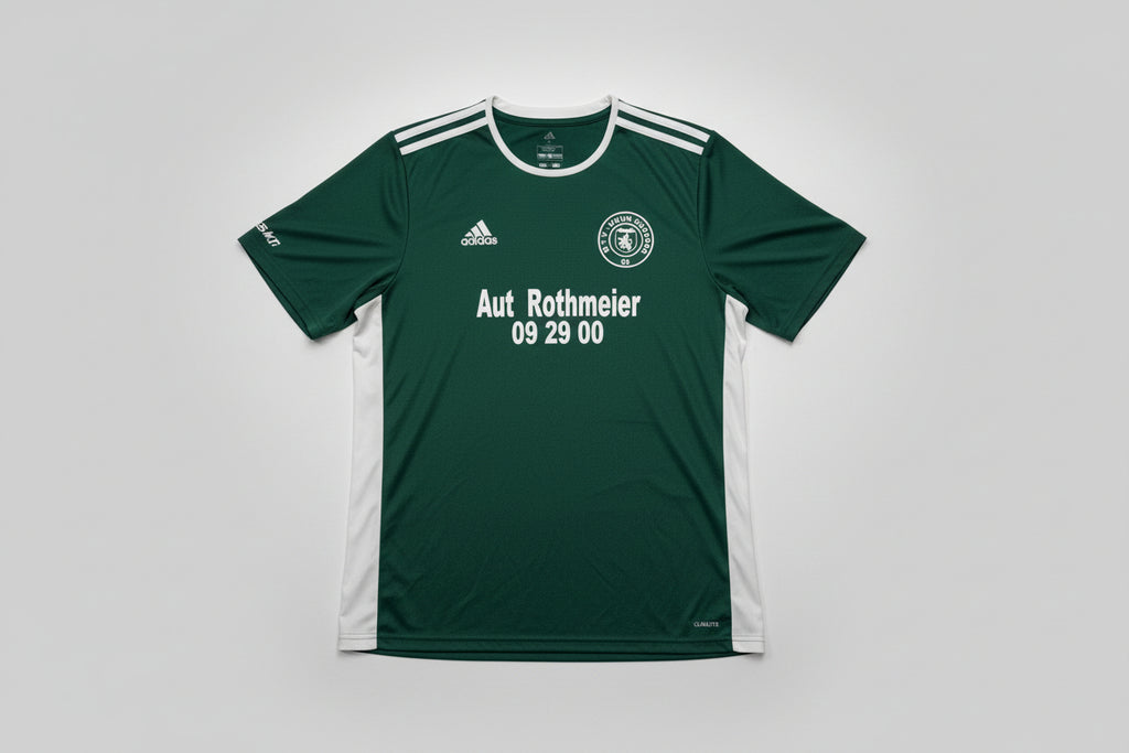 Green sports jersey with Adidas logo on a white background