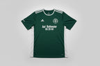 Green sports jersey with Adidas logo on a white background