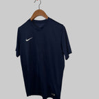 Nike Dri-FIT football jersey featuring a navy blue color with a white swoosh logo. SIZE L SKU 7466

