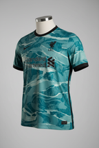 Nike FC Liverpool 20/21 Away Men's Vintage Soccer Jersey in teal and black colorway with club crest, Nike swoosh, and Standard Chartered sponsor logo.