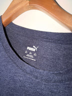 
Puma men's regular fit graphic logo crew neck t-shirt in a dark blue/grey heather color SIZE 3XL SKU7340