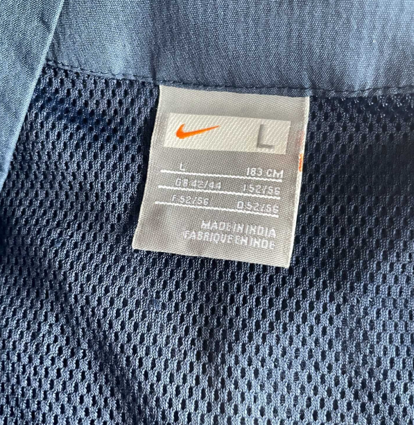 Vintage men Nike navy blue full zip high neck track jacket in L|SKU 5703