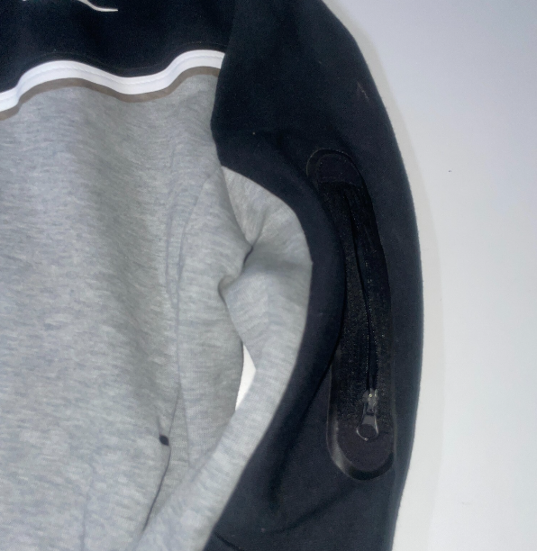 Vintage women Nike sport wear tech full zip grey & black colorblock hoodie in L|L22 W20|SKU 6519