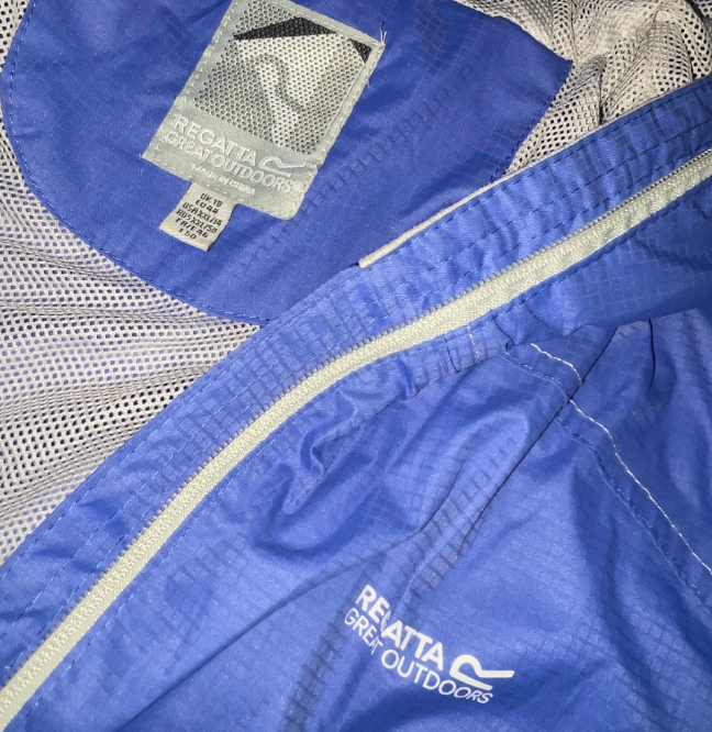 Regatta  blue women’s lightweight Rain Jacket with hood  RWW301 XL L 31 W 22