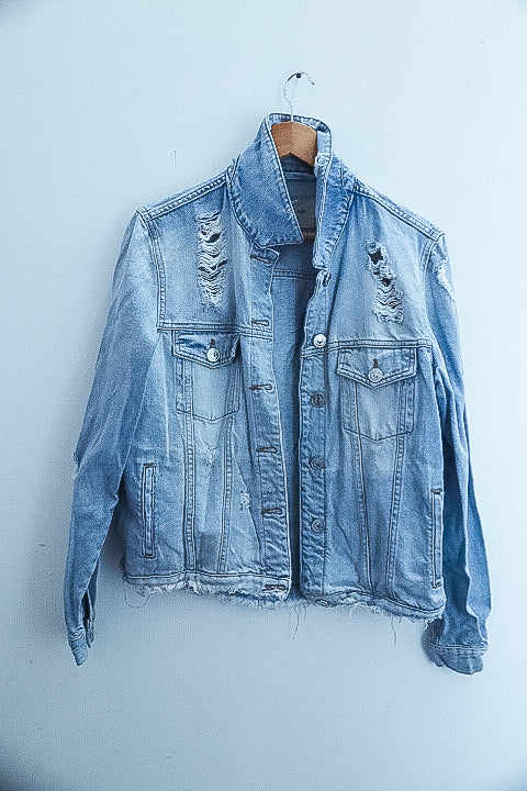 Vintage womens blue denim jacket with tears size 14