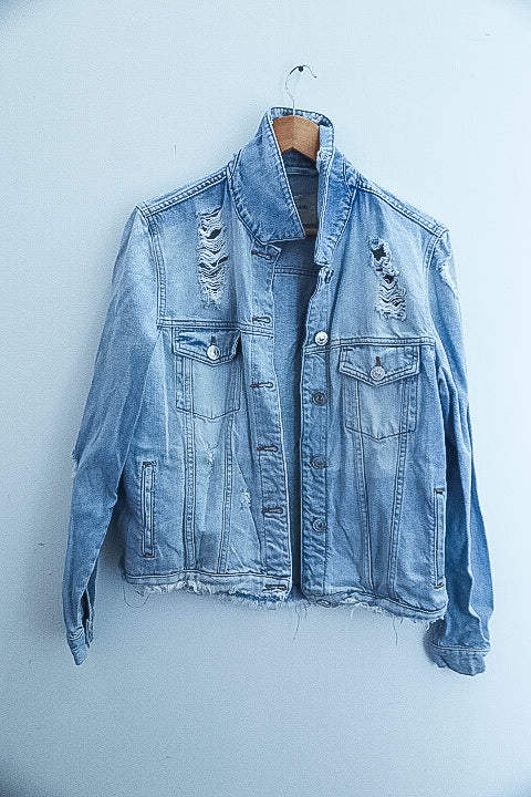 Vintage womens blue denim jacket with tears size 14