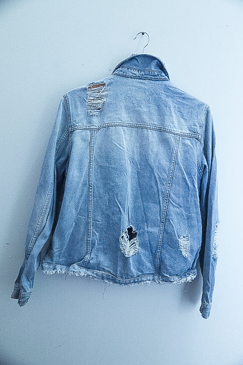 Vintage womens blue denim jacket with tears size 14
