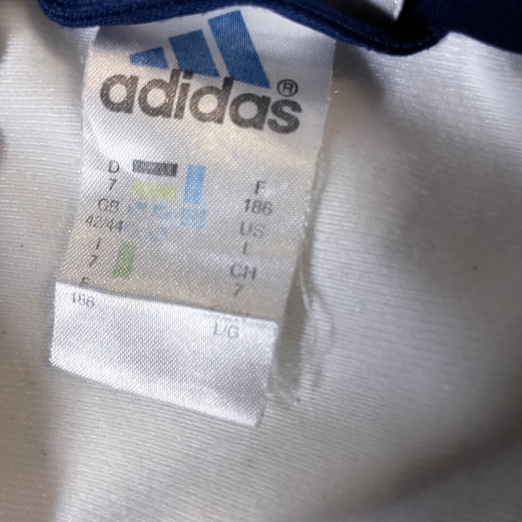 Vintage Adidas men's blue full zip track top in M
