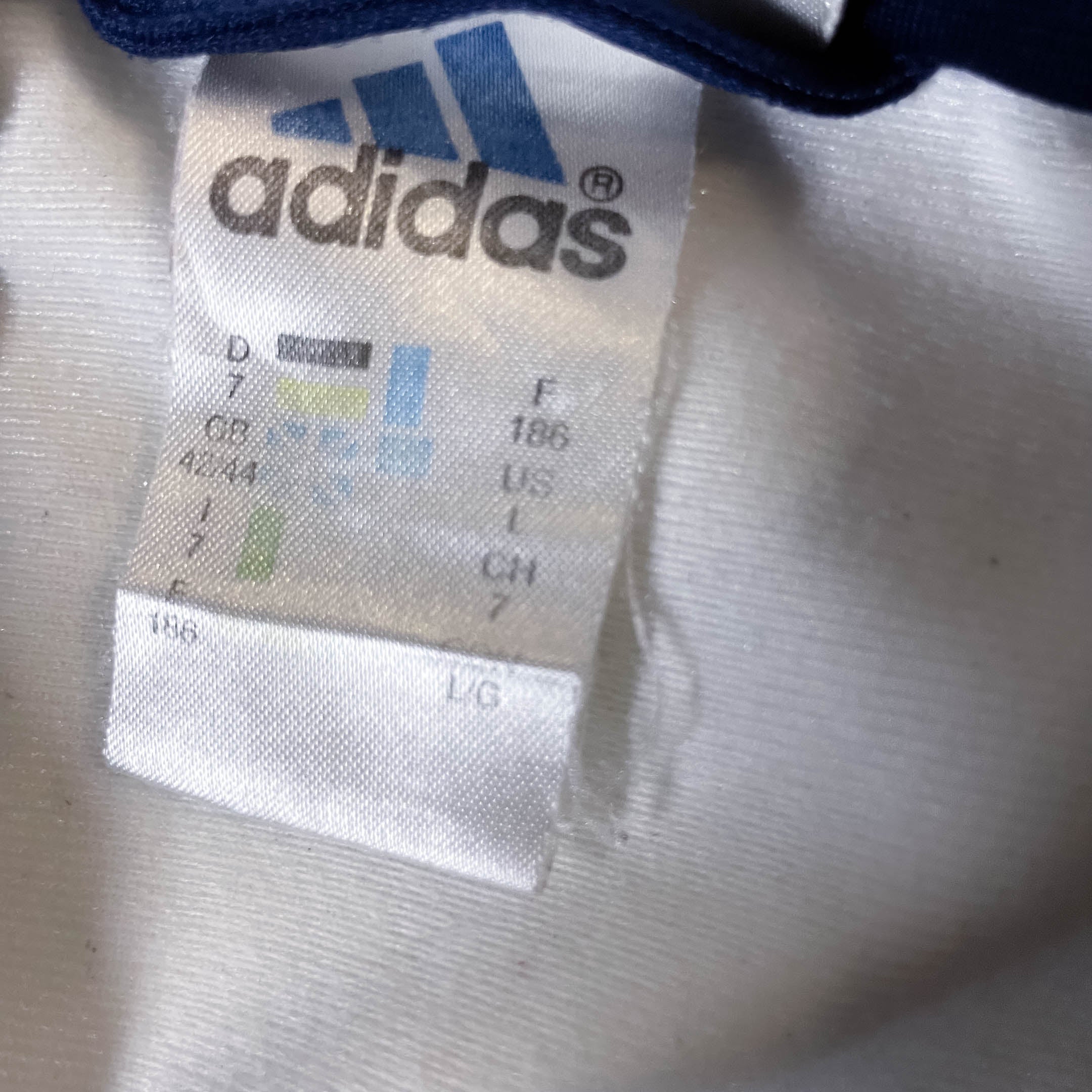 Vintage Adidas men's blue full zip track top in M