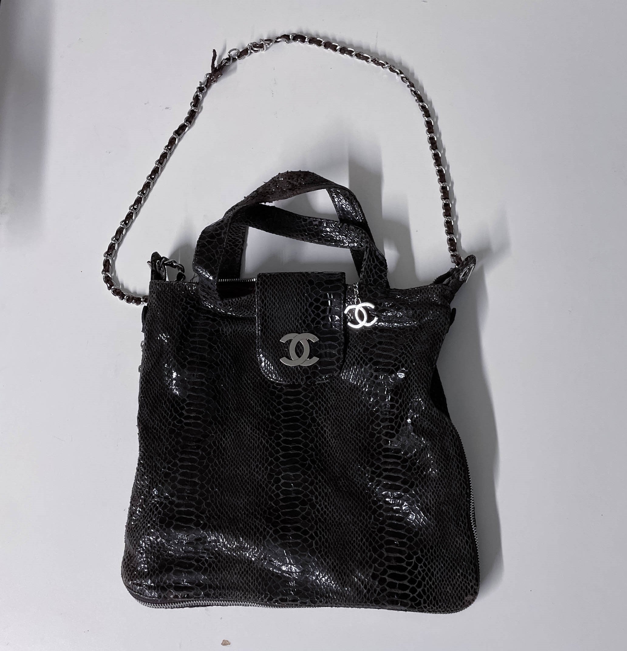 Vintage Black Chanel Snake skin womens genuine authentic handbag with prook