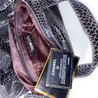 Vintage Black Chanel Snake skin womens genuine authentic handbag with prook