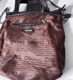 Vintage Black Chanel Snake skin womens genuine authentic handbag with prook